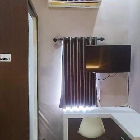 Hotel Reddoorz Syariah Near Sultan Syarif Kasim II Airport à Pekanbaru Extérieur photo