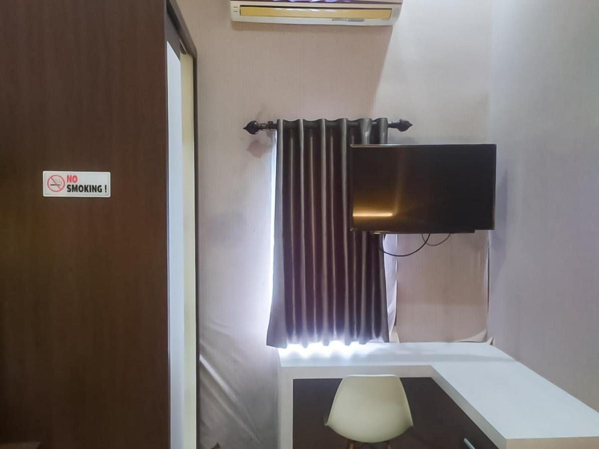 Hotel Reddoorz Syariah Near Sultan Syarif Kasim II Airport à Pekanbaru Extérieur photo
