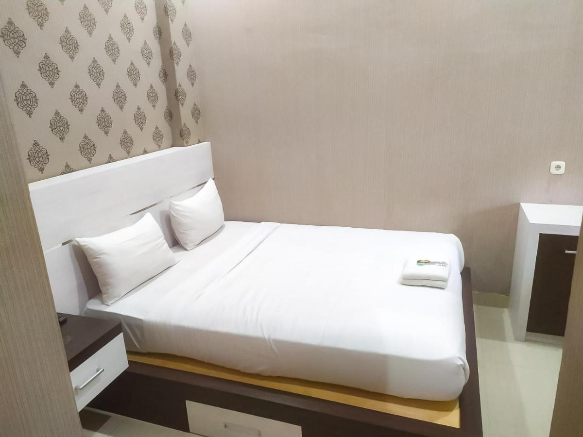 Hotel Reddoorz Syariah Near Sultan Syarif Kasim II Airport à Pekanbaru Extérieur photo